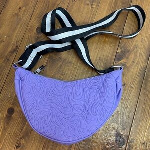 Skinnydip London Wave Quilt Croissant Crossbody Sling Bag Purse in lilac color